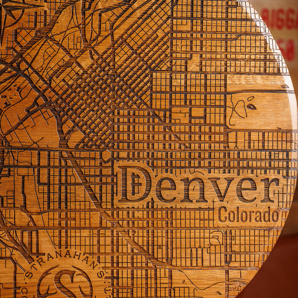 Closeup of the "Denver" map labeling detail within the map on the Stranahan's Barrel Sign