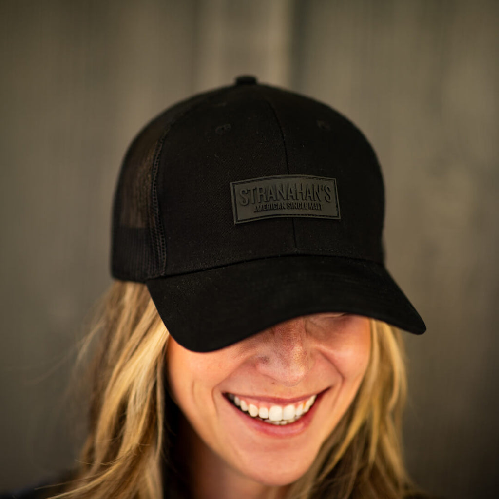 Stranahan's Black Trucker hat with front label patch