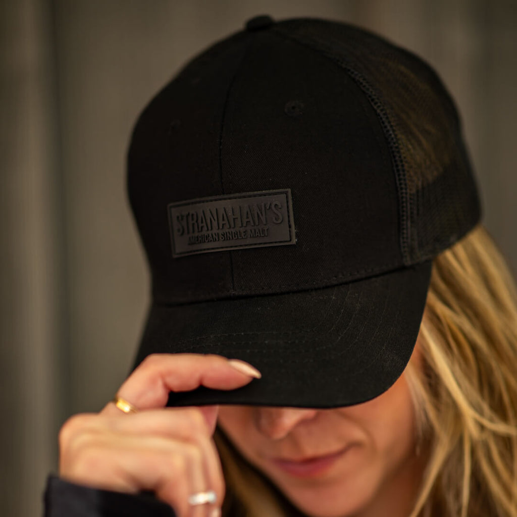 Stranahan's Black Trucker hat with front label patch