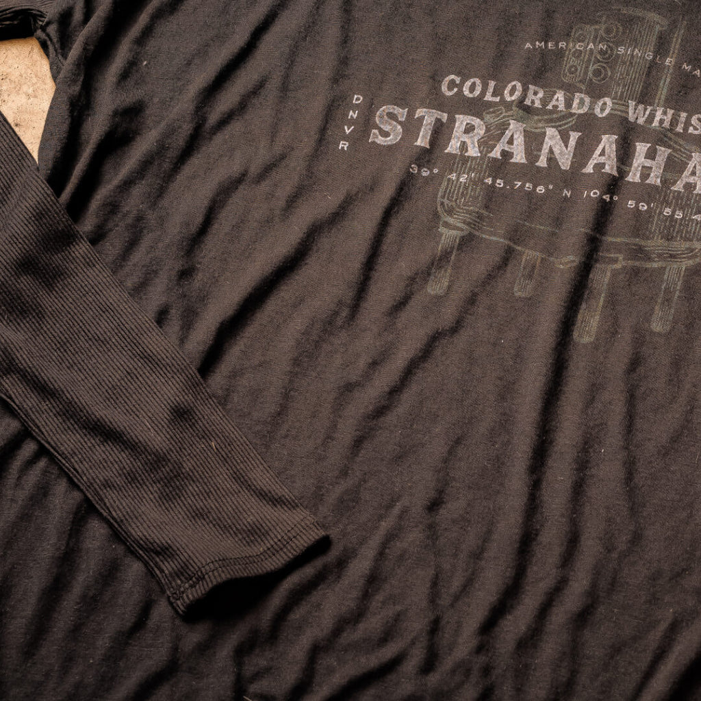 Closeup of Stranahan's Women's Black Still Long Sleeve Tee front graphic and sleeve