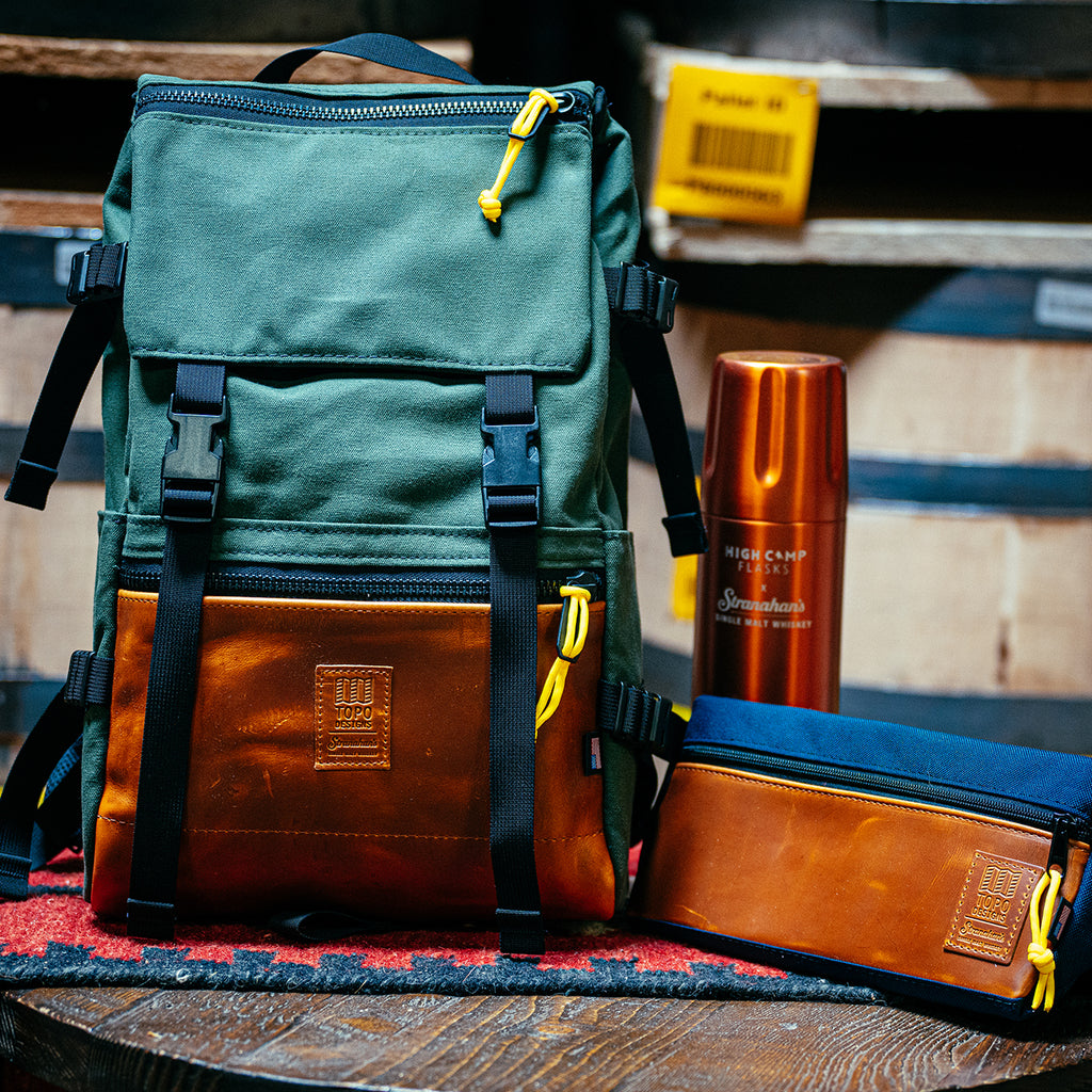 Stranahan's x Topo Designs backpack, day bag, and thermos.