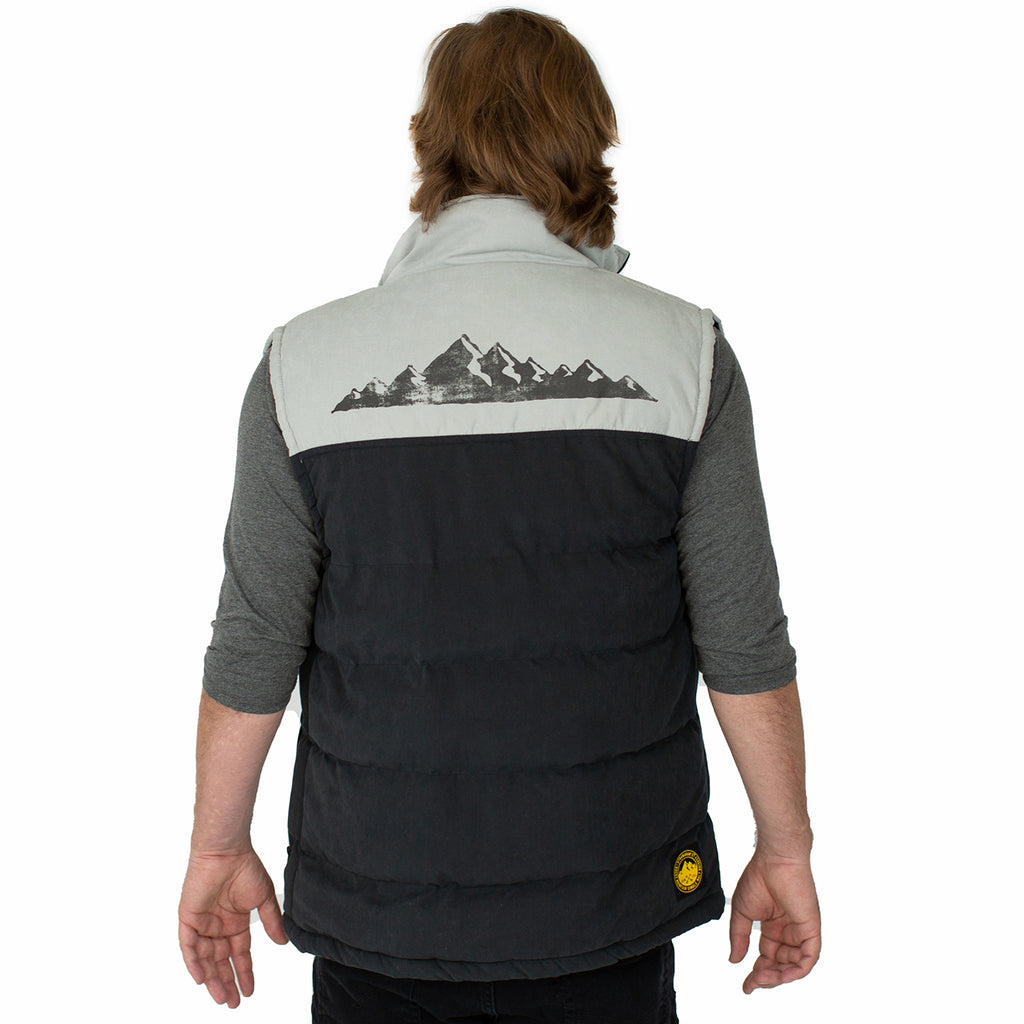Back view of Stranahan's puffer vest on male model.