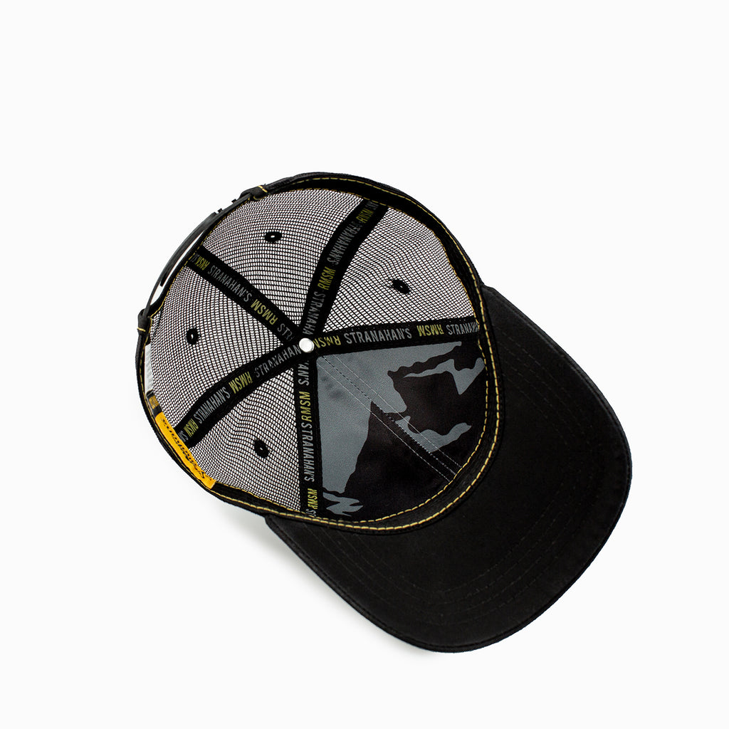 Inside view of grey and black trucker hat with yellow Stranahan's logo.